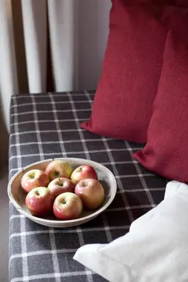a bowl of apples on top of a table at Garni Karin in Corvara in Badia