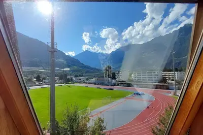 a view of a race track from a window at Renovated flat close to the centre in Merano