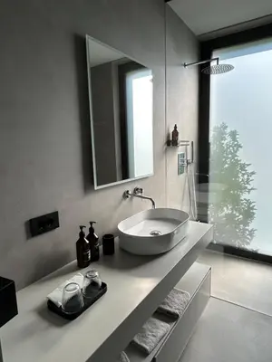 a bathroom with a sink and a mirror at Agriturismo Insolito in Terlano