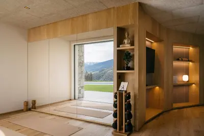 a room with a large glass door with a view at ANTON Nature Hideaway in Naz-Sciaves