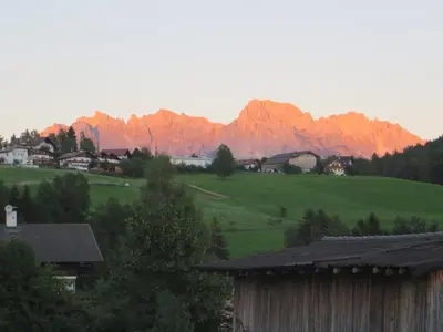 a view of a village with mountains in the background at Unterwirtshof in Nova Ponente
