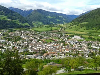 an aerial view of a town in the mountains at Stroblhof in Vipiteno