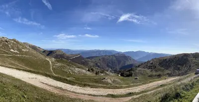 a dirt road on the side of a mountain at Apartman Anda in Cavalese