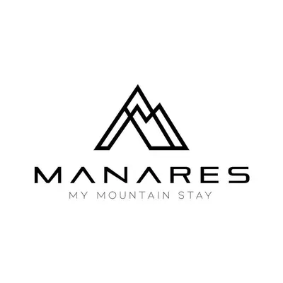 a letter monogram logo with a mountain symbol at MANARES - my mountain stay in San Lorenzo di Sebato