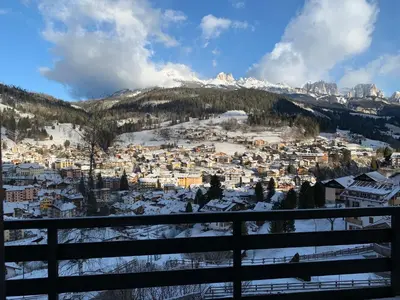 a view of a town in the snow at Casalta by Go New Location in Moena