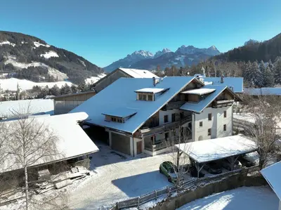 an aerial view of a house in the snow at Schusterhof - Urlaub auf dem Bauernhof in Novale