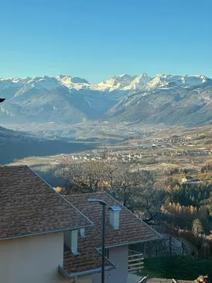 a view of a mountain range from a house at Casa vacanze Da Bianca in Castelfondo