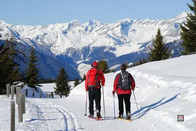 two people on skis on a snow covered mountain at Vitroler Hof in Rodengo