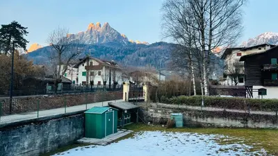 a yard with a gazebo and a house at Appartamento Margherita in Transacqua