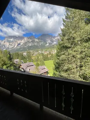 a view of the mountains from a balcony at Chalet Stravedo by Ca-Sa Check in Villanova