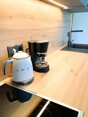 a blender sitting on a counter in a kitchen at Amontis Dolomites in Siusi