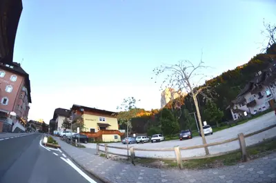 a street with cars parked on the side of a road at Garni Ossi in Santa Cristina in Val Gardena