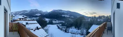 a view of a snow covered mountain from a balcony at Appart-Chalet Litegosa in Panchia