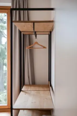 a closet in a room with a window at Promenaden Lounge in Merano