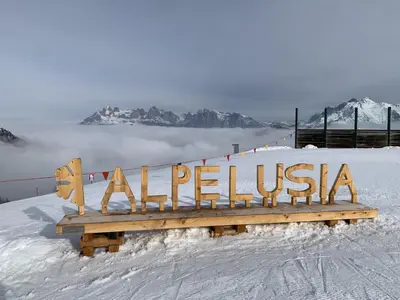 a wooden sign that reads ak pelka in the snow at Casa Lucia Moena in Moena