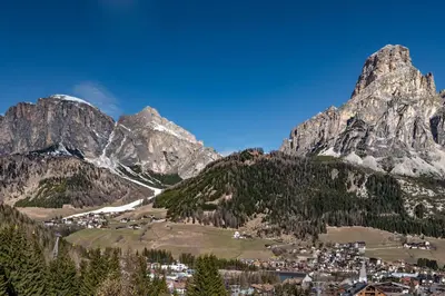 a view of a town in the mountains at ciasa monaco in Corvara in Badia
