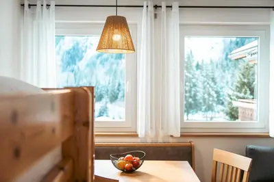 a bowl of fruit on a table in front of a window at Felda Appartements in Lappago