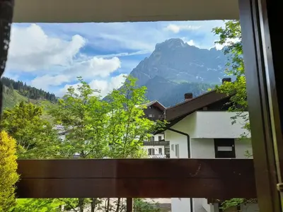 a view of a mountain from a window at Fradusta 213 in San Martino di Castrozza