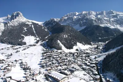 an aerial view of a ski resort in the mountains at Residence Carin in Selva di Val Gardena