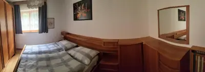 a room with a harpsichord and a mirror at VILLA TERESA in San Lugano