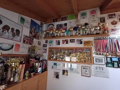 a room with a wall filled with lots of items at VILLA TERESA in San Lugano