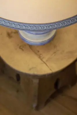 a wooden table with a mirror on top of it at Ca' del Sole in San Vito di Cadore