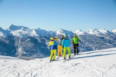 a group of skiers on top of a mountain at Il Nido del Picchio in Anterivo