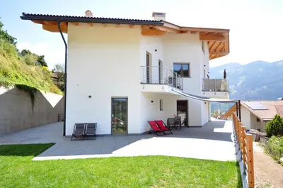 a villa with a view of the backyard at Abete rosso in Tesero