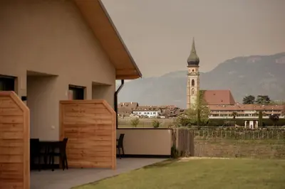 a view of a building with a clock tower at Gutshof Ebner in San Paolo