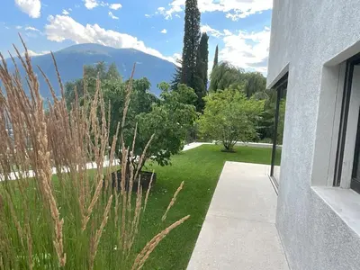 a view of a garden from a house at Villa Tschaupp in Tirolo