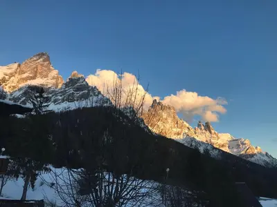 a view of a mountain with snow on it at Appartamento da Meto in San Martino di Castrozza