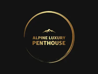 a gold logo with a mountain in the middle at Luxury Penthouse - Between Kronplatz, 3 Peaks Dolomites and Lake Prags in Monguelfo