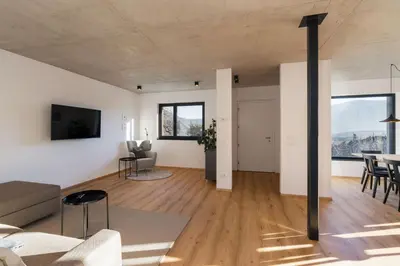 a living room with a couch and a table at Ferienhaus Obergfillhof in Missiano