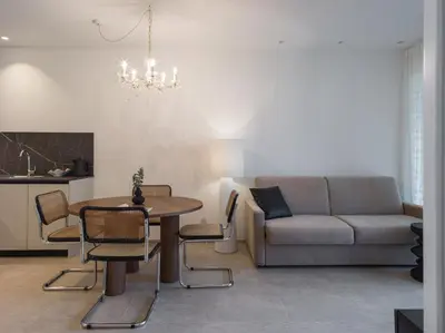 a living room with a couch and a table at The Hills in Merano