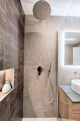 a bathroom with a shower and a sink at Lauben Studio Bolzano in Bolzano