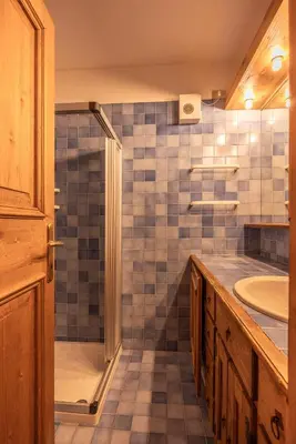 a bathroom with a shower and a sink at Casa Allegra, con balcone panoramico in San Vito di Cadore