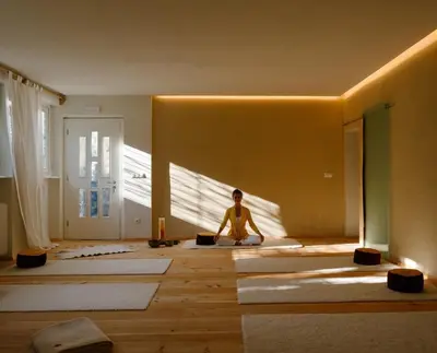 a woman sitting on the floor in a room at Alpimena Natur-Apartments Meran in Merano