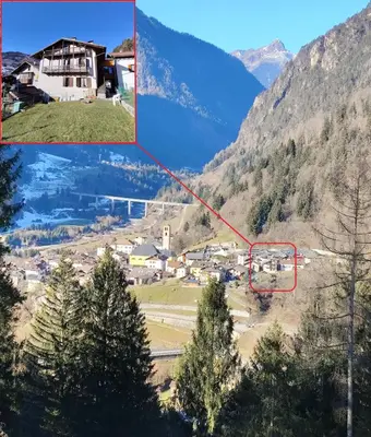 a view of a village in the mountains at Casa Sartorin in Canale San Bovo