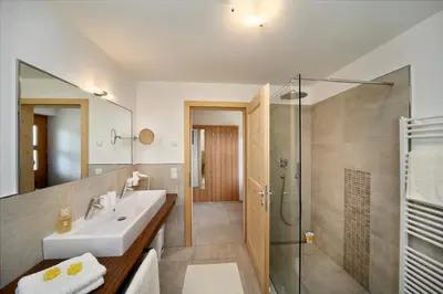a bathroom with a sink and a shower at Pichlerhof in Avelengo