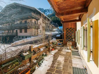 a balcony of a building with snow on the ground at Apartment Mason Scarzin by Interhome in Alba di Canazei