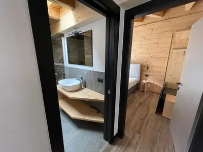 a bathroom with a sink and a mirror at - Piz Boe - Canazei center app. in Canazei