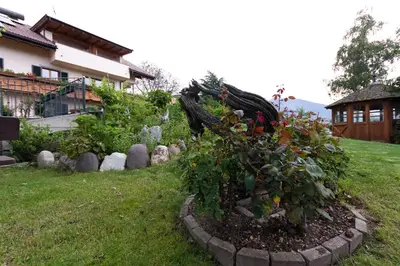 a garden in the backyard of a house at Haus Sabine in Laion