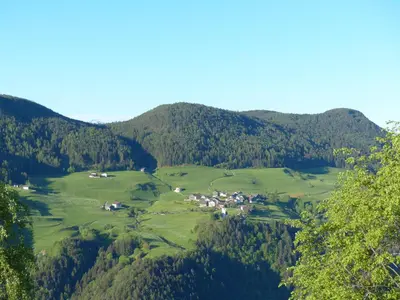 an aerial view of a valley with mountains at Haus Sabine in Laion