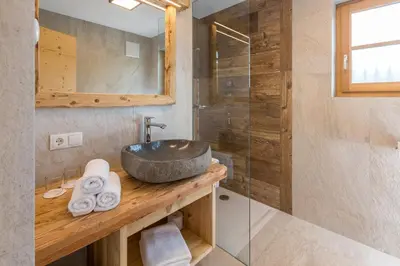 a bathroom with a sink and a shower at Bäckerhof in Tesido