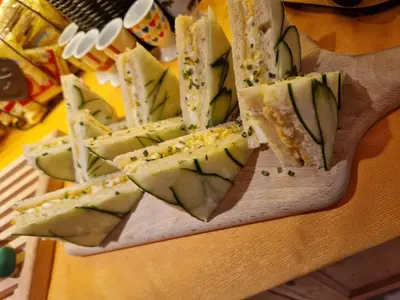 a bunch of sandwiches on a cutting board at B&B Chalet Brigitte Hike & Bike in Arabba
