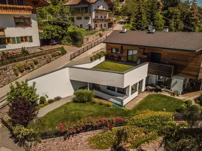 an aerial view of a house with a garden at Appartment Waldrand in Castelrotto