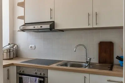 a kitchen with a sink and a counter top at Apartment Residence Veronika in Ora/Auer