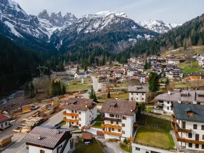 an aerial view of a village in the mountains at Appartamento Sandra - Molino in Falcade