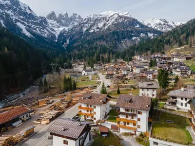an aerial view of a village in the mountains at Appartamento Sandra - Molino in Falcade
