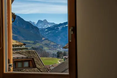 a view from a window of a mountain valley at Casa Corradini by Go New Location in Carano
